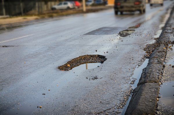 Councils receive just two thirds of the funds needed for road repairs 
