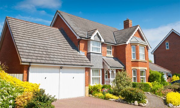 Residential streets overflowing with cars that don’t fit into private garages